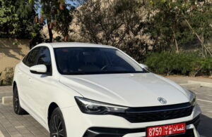 White MG5 2026 sedan available for monthly car rental in Oman